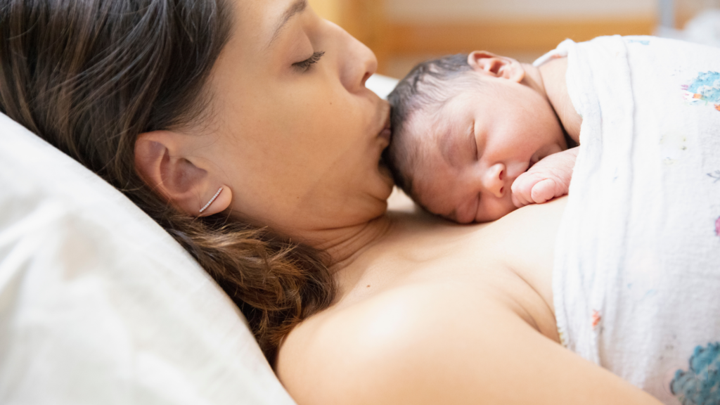 newborn baby on mother's chest: placenta helps you heal postpartum